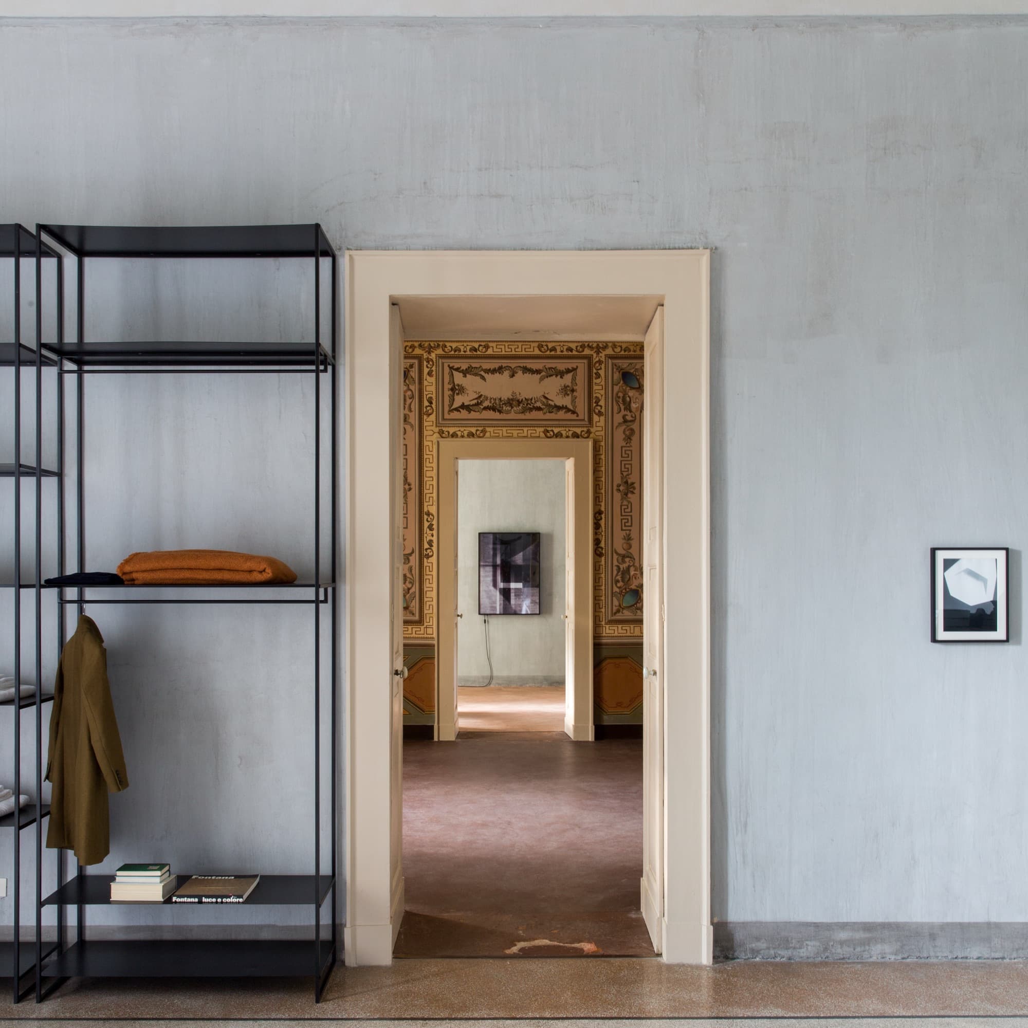 Enfilade of doorways through the frescoed wings